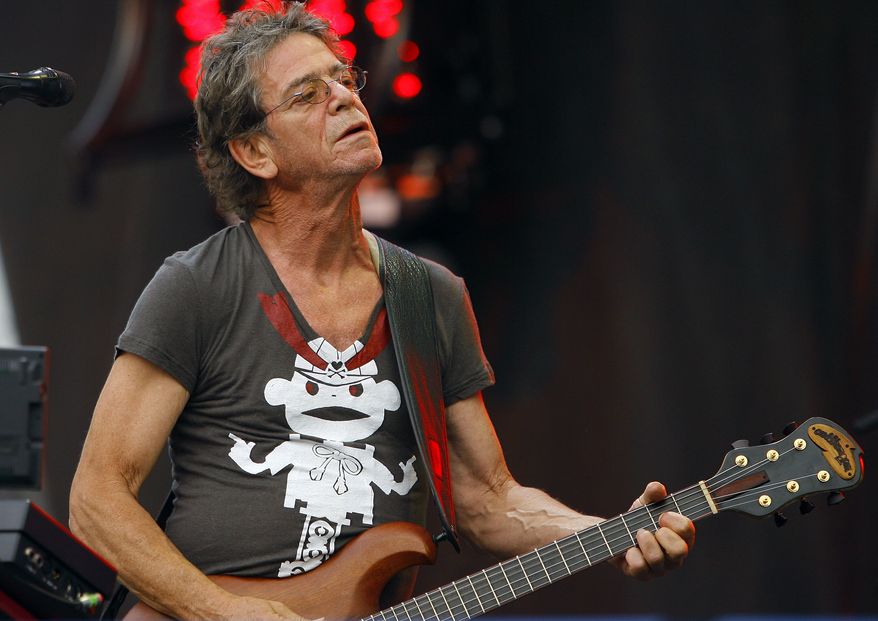 FILE - In this Sunday, Aug. 9, 2009 file photo, Lou Reed performs at the Lollapalooza music festival, in Chicago. The rocker's life was decidedly unconventional, but he wanted his estate used for a very traditional purpose: to benefit his wife and other relatives. Reed’s will was filed Monday, Nov. 4, 2013, in a New York City court. (AP Photo/John Smierciak, File)