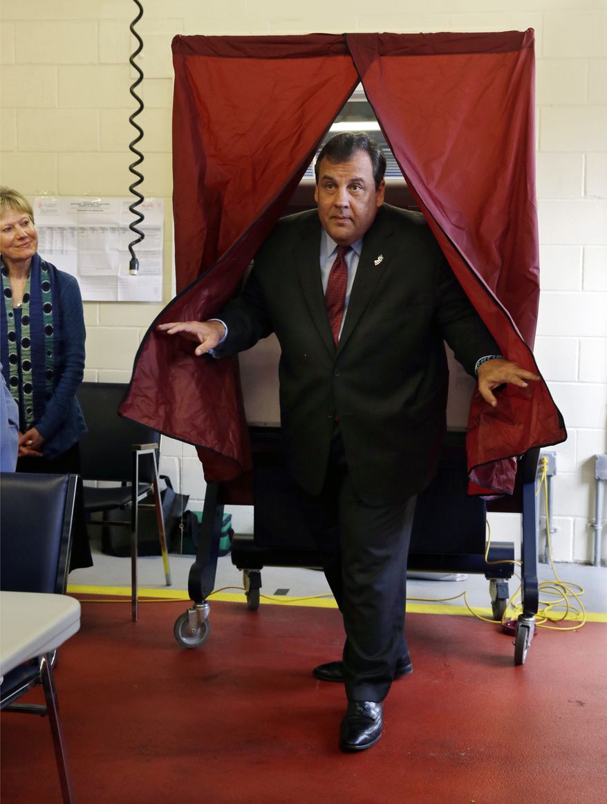 Republican New Jersey Gov. Chris Christie steps from the booth after voting in Mendham Township, N.J., Tuesday, Nov. 5, 2013. Christie is facing Democratic challenger Barbara Buono in Tuesday's election. (AP Photo/Mel Evans)