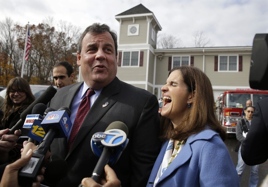 New Jersey first lady, Mary Pat Christie, laughs as husband, Republican New Jersey Gov. Chris Christie, jokes with the media after they voted in Mendham Township, N.J., Tuesday, Nov. 5, 2013. Christie is facing Democratic challenger Barbara Buono in Tuesday's election. (AP Photo/Mel Evans)