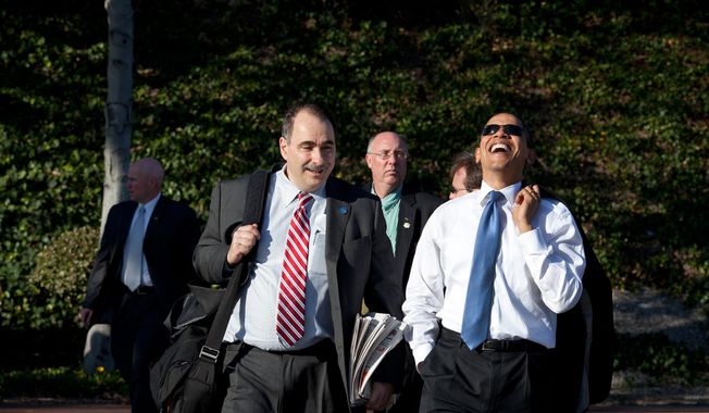 ** FILE ** President Barack Obama laughs while walking with senior adviser David Axelrod following an event at the Costa Mesa Town Hall at OC Fair &amp; Event Center in Costa Mesa, Calif., March 18, 2009. (Official White House Photo by Pete Souza)