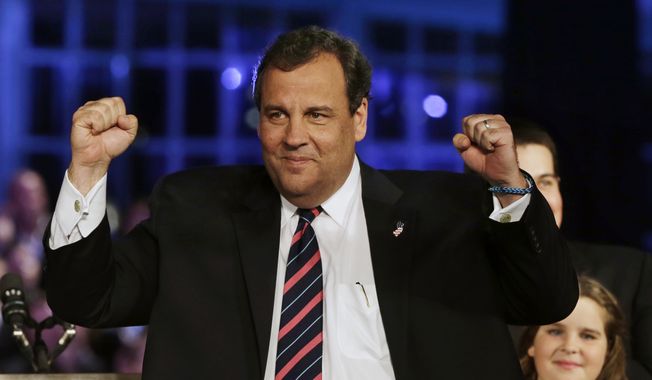 Republican New Jersey Gov. Chris Christie celebrates his re-election victory in Asbury Park, N.J., on Tuesday, Nov. 5, 2013, after defeating state Sen. Barbara Buono, the Democratic challenger. (AP Photo/Mel Evans)