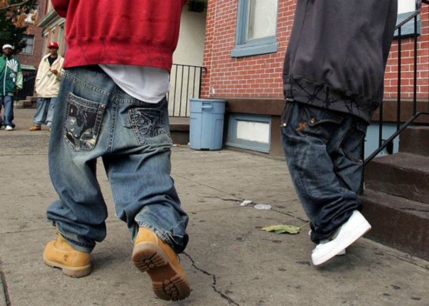 Officials at Henderson State University in Arkansas are defending signs that were recently posted on campus that ban sagging pants, despite complaints that they unfairly target black students. (Associated Press) ** FILE **