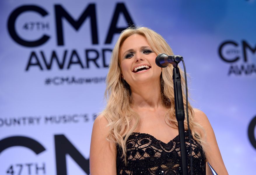 Miranda Lambert speaks backstage after winning the award for female vocalist of the year at the 47th annual CMA Awards at Bridgestone Arena on Wednesday, Nov. 6, 2013, in Nashville, Tenn. (Photo by Evan Agostini/Invision/AP)