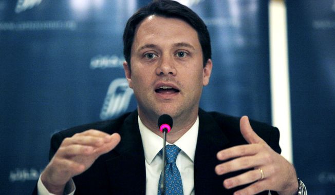 ** FILE ** In this June 19, 2012, file photo, Democratic Georgia state Sen. Jason Carter talks during a news conference for the Carter Center&#x27;s election witnessing mission in Egypt, in Cairo. Carter, the grandson of former President Jimmy Carter, tells The Associated Press Thursday Nov. 7, 2013, he plans to run for governor of Georgia next year. (AP Photo/Nasser Nasser, File)