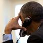 President Barack Obama talks on the phone in the Oval Office, June 13, 2012. (Official White House Photo by Pete Souza)