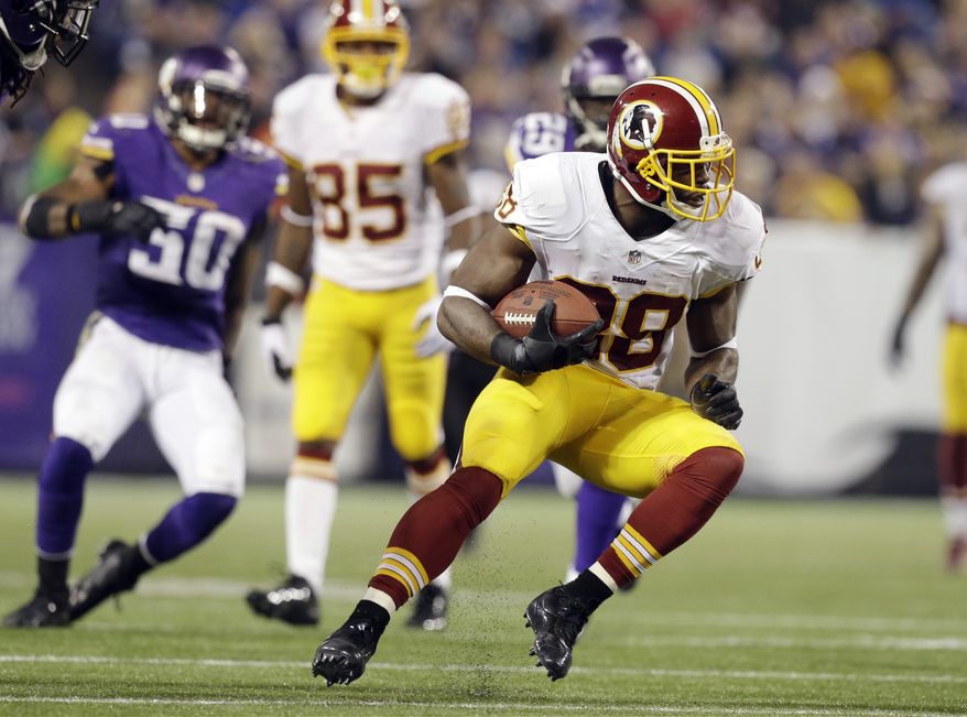 Washington Redskins wide receiver Pierre Garcon makes a cut in an NFL football game against the Minnesota Vikings, Thursday, Nov. 7, 2013 in Minneapolis. (AP Photo/Jim Mone)