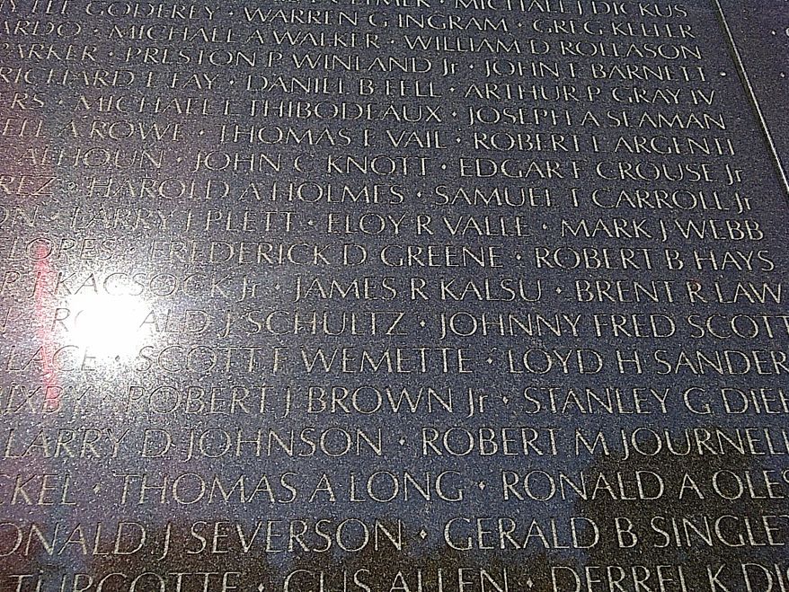 James R. Kalsu's name is visible on the Vietnam War Memorial wall in Washington, D.C., on November 10, 2013. Kalsu, a Buffalo Bills lineman, was the only active NFL player killed in Vietnam. (Nathan Fenno/The Washington Times)