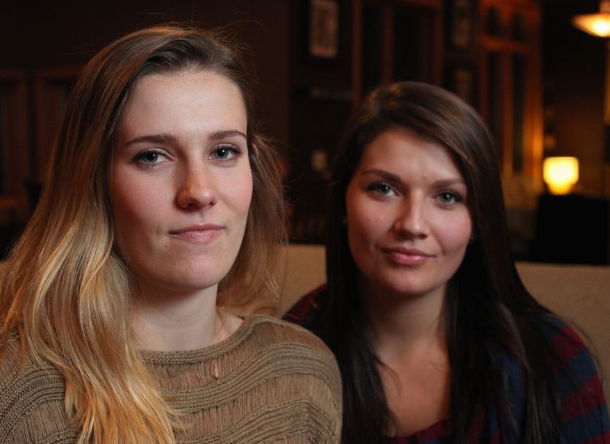 Sisters Madelyne Meylor, 20, left, and her sister Olivia, 19, of Mount Horeb, Wis., have filed a federal claim, saying they believe a cervical cancer vaccine caused their ovaries to stop producing eggs. (ASSOCIATED PRESS)