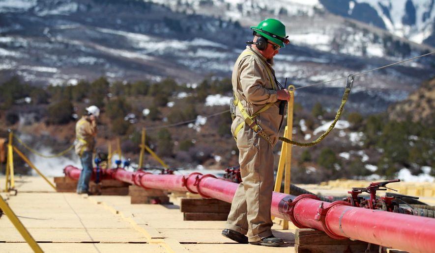 A worker helps monitor water pumping pressure and temperature, at the site of a natural gas hydraulic fracturing and extraction operation in western Colorado. Tisha Schuller, president of the Oil and Gas Association in Colorado, said, &quot;Boulder and Lafayette were nothing more than symbolic votes. Lafayette&#x27;s last new well permit was in the early 1990s and Boulder&#x27;s last oil and gas well was plugged in 1999.&quot; (ASSOCIATED PRESS)