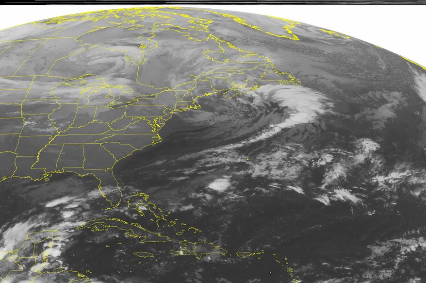 This NOAA satellite image taken Monday, Nov. 11, 2013 at 1:45 a.m. EST shows scattered snow showers across northern New England and New York. A cold front with rain and snow showers is moving through the Upper Mississippi Valley and western Great Lakes region. High pressure is the rule across the Ohio/Tennessee Valleys and Southeast. (AP Photo/Weather Underground)