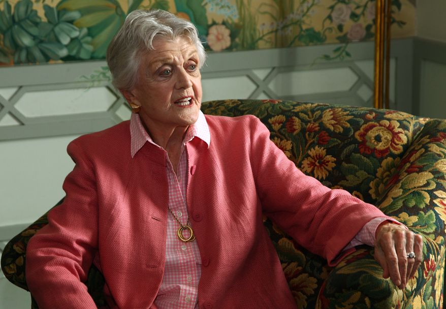 ** FILE ** In this Jan. 7, 2013, file photo, actress Angela Lansbury poses for photos in Sydney, Australia. The 88-year-old actress says "it's a mistake" for NBC to call a new show "Murder, She Wrote." (AP Photo/Rick Rycroft, File)