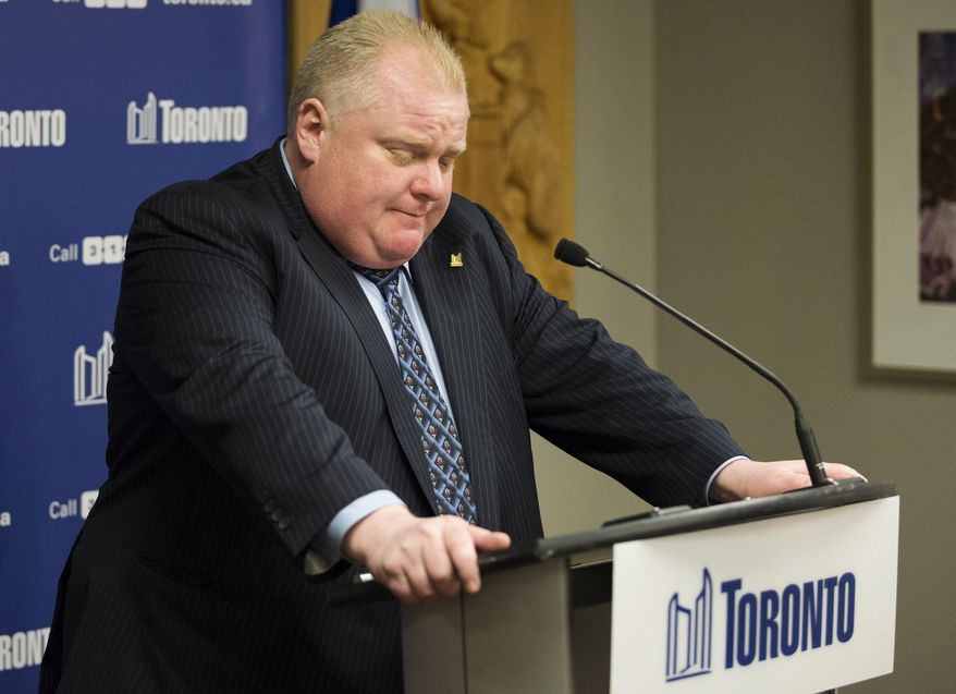 Toronto Mayor Rob Ford speaks during a press conference to advocate relief for the people in the Philippines affected by Typhoon Haiyan, Tuesday, Nov. 12, 2013 in Toronto. A defiant Toronto Mayor Rob Ford said Tuesday he'll fight any attempt to try force him to take a leave of absence and vowed his first council meeting since he admitted smoking crack will be a raucous affair. (AP Photo/The Canadian Press, Mark Blinch)
