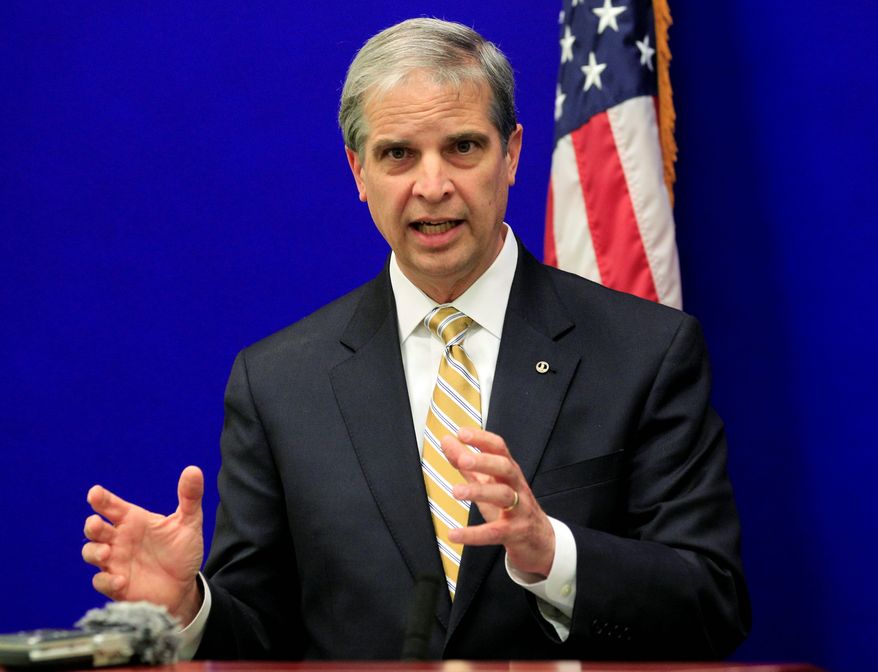 Republican attorney general candidate Mark R. Obenshain announces his transition team Wednesday, hours after Democratic candidate Mark R. Herring announces his own as both teams await official certification Nov. 25. (associated press)