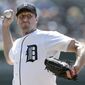 Detroit Tigers pitcher Max Scherzer throws against the Oakland Athletics in the first inning of a baseball game in Detroit, Thursday, Aug. 29, 2013.  (AP Photo/Paul Sancya)