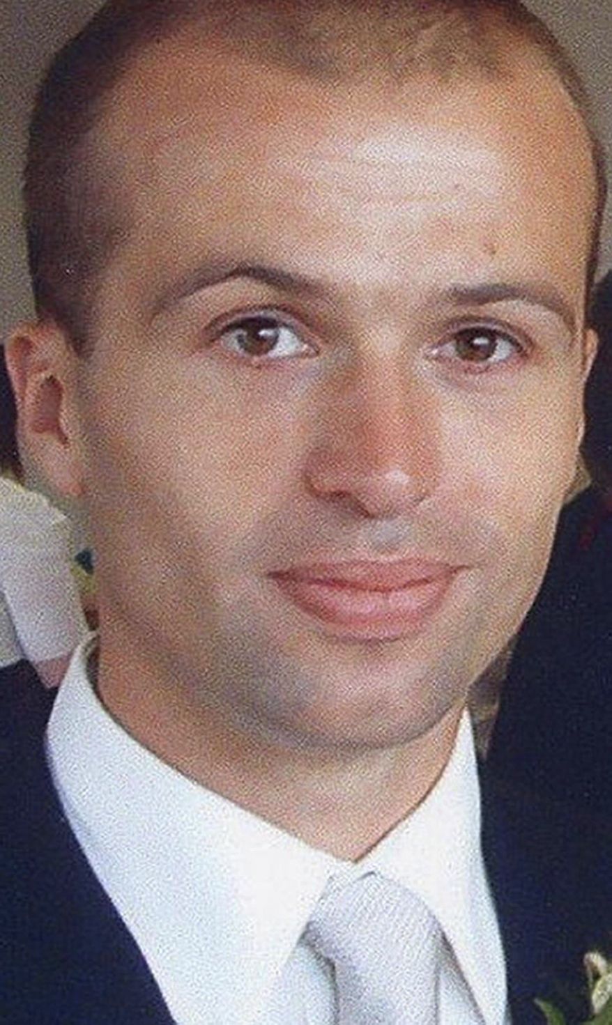 British intelligence official Gareth Williams worked for the United Kingdom's secret eavesdropping service, GCHQ, but was attached to the country's MI6 overseas spy agency when his naked and decomposing remains were found in 2010 at his central London apartment. Scotland Yard said on Wednesday, Nov. 13, 2013, that Williams likely died in an accident with no one else involved. (AP Photo/Metropolitan Police)