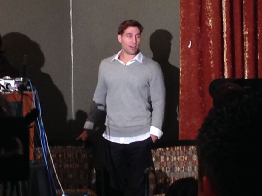 Ryan Ferguson arrives at the Tiger Hotel in Columbia, Mo., on Tuesday, Nov. 12, 2013, to speak to supporters after being freed from prison earlier in the evening. A state appeals court last week overturned his murder and robbery convictions in the 2001 slaying of Columbia Daily Tribune Sports Editor Kent Heitholt, and Mr. Ferguson's release followed a decision Tuesday by the Missouri attorney general not to retry him. (AP Photo/David A. Lieb)