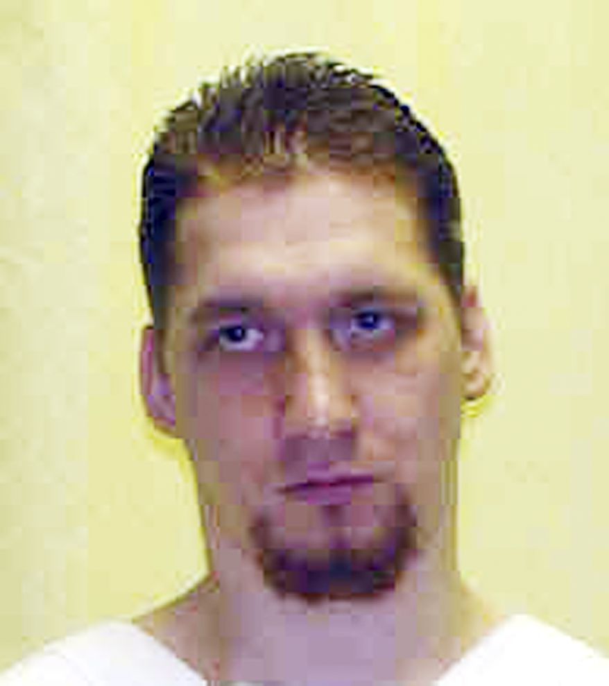FILE - This undated file photo provided by the Ohio Department of Rehabilitation and Correction shows Ronald Phillips. Ronald Phillips, 40, was scheduled to be put to death Thursday Nov. 14, 2013 with a lethal injection of a two-drug combination not yet tried in the U.S., but Gov. John Kasich issued a stay of execution to consider the inmate's unprecedented organ donation request, Wednesday. The execution date has been reset for July 2. (AP Photo/Ohio Department of Rehabilitation and Correction, File)