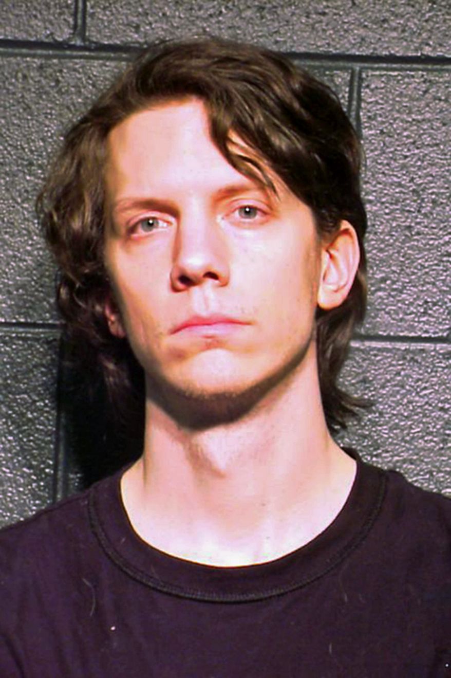 File - This March 5, 2012 file photo provided by the Cook County Sheriff's Department in Chicago shows Jeremy Hammond. A New York judge sentenced Hammond to ten years, Friday, Nov. 15, 2013 for his involvement in cyber-attacks on corporations and government agencies worldwide. (AP Photo/Cook County Sheriff's Department, File)