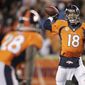 Denver Broncos quarterback Peyton Manning (18) throws to running back Montee Ball (28) against the Kansas City Chiefs in the fourth quarter of an NFL football game, Sunday, Nov. 17, 2013, in Denver. (AP Photo/Joe Mahoney) 