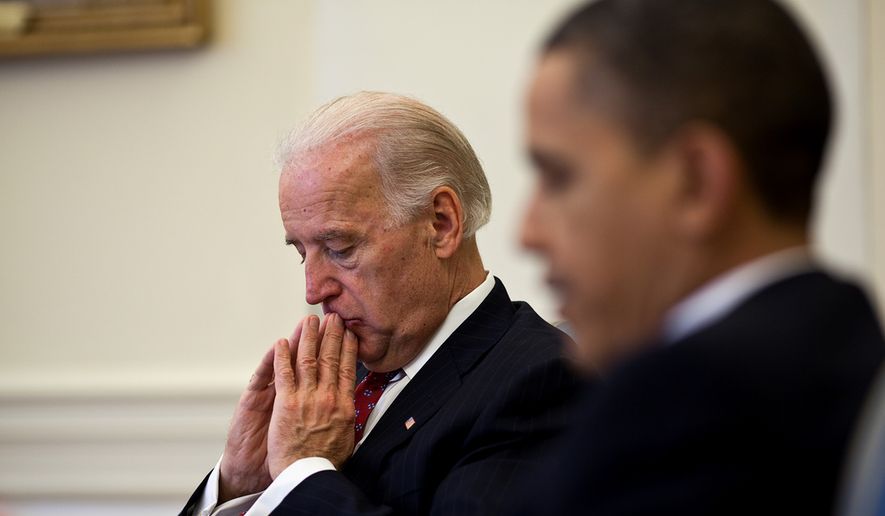 President Barack Obama and Vice President Joe Biden meet with advisors for a health care implementation meeting in the Oval Office, March 30, 2010. (Official White House Photo by Pete Souza)