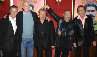 FILE - This is a Thursday, Oct. 15, 2009. file photo of  from left, actors Michael Palin, John Cleese, Terry Jones, Terry Gilliam and Eric Idle attend the IFC and BAFTA premiere of &quot;Monty Python: Almost The Truth (The Lawyers Cut)&quot;, in New York. Python member Terry Jones told the BBC on Tuesday Noiv. 19, 2013 that he&#39;s excited the group is reuniting. He said he hopes to make enough money to pay off his mortgage. The group had its first big success with the Monty Python&#39;s Flying Circus TV show, which ran from 1969 until 1974, winning fans around the world with its bizarre sketches. The group branched out into movies including &quot;Life of Brian&quot; and backed theatrical shows such as &quot;Monty Python&#39;s Spamalot.&quot; The five surviving members last performed together in 1998. The sixth member, Graham Chapman, died of cancer in 1989. (AP Photo/Peter Kramer, File)