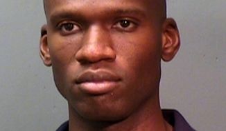 BACKGROUND: Aaron Alexis was arrested by Fort Worth, Texas, police on suspicion of discharging a firearm before he was granted a security clearance. (Associated Press)