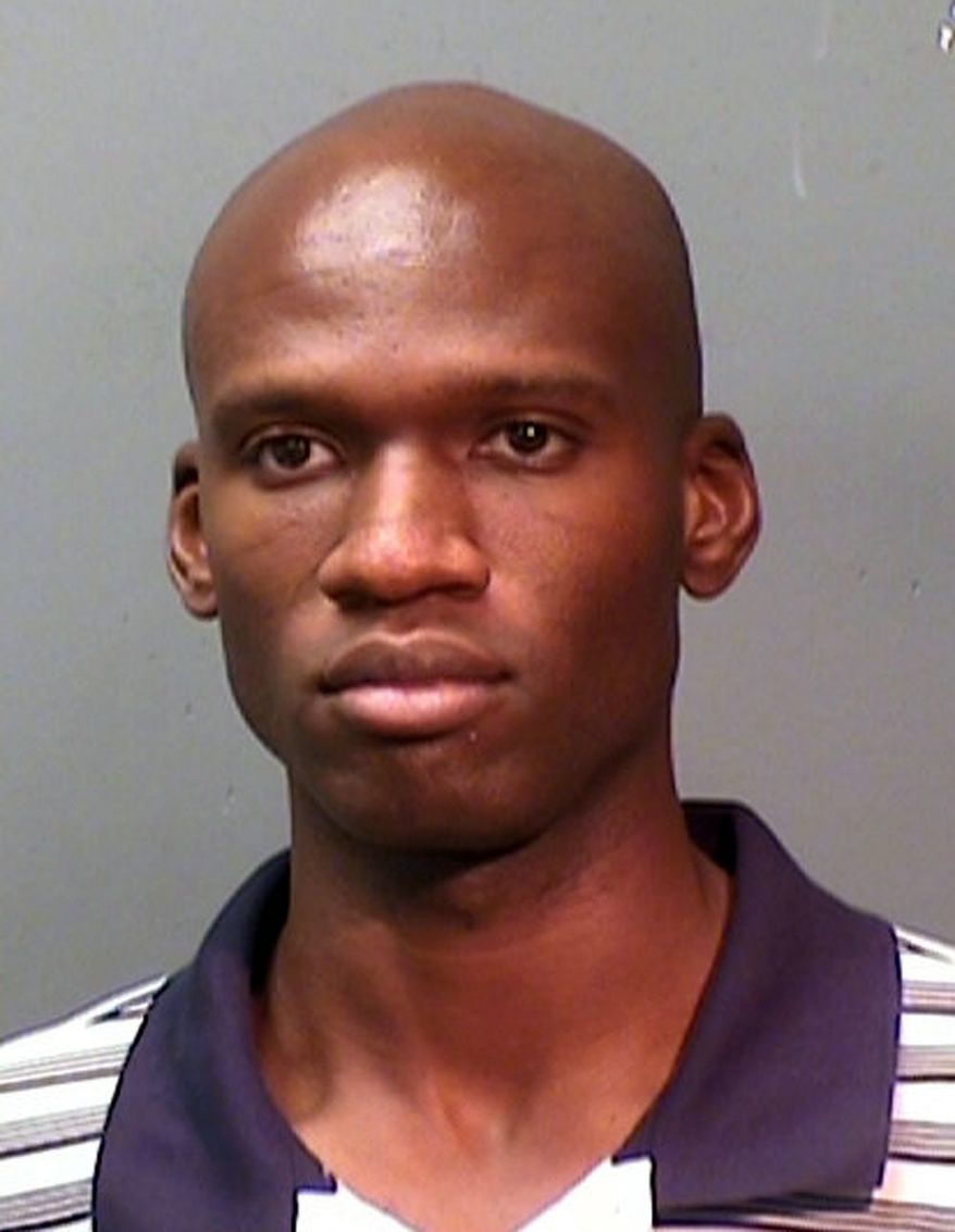 BACKGROUND: Aaron Alexis was arrested by Fort Worth, Texas, police on suspicion of discharging a firearm before he was granted a security clearance. (Associated Press)