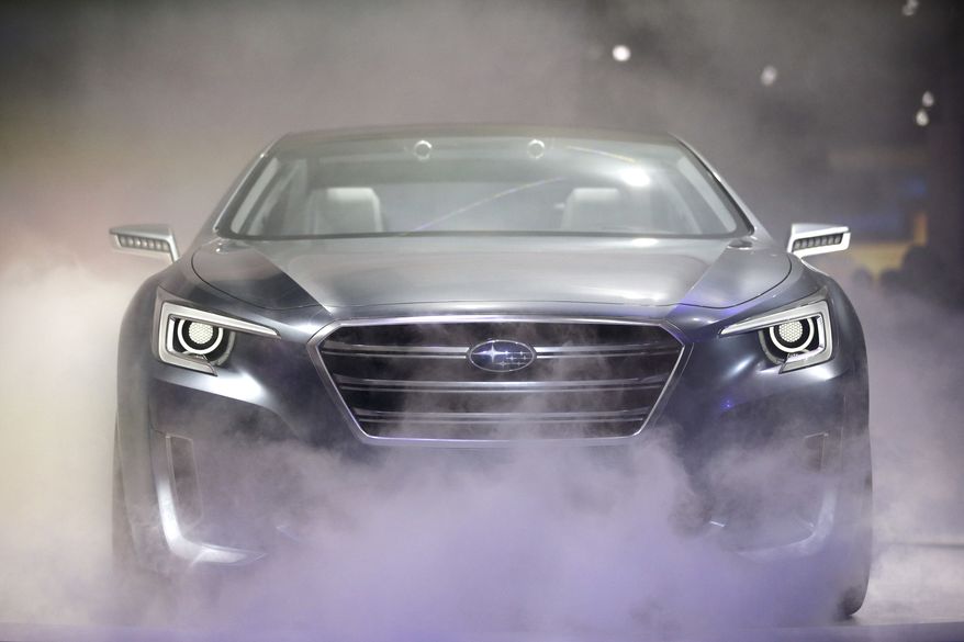 The Subaru Legacy concept vehicle is introduced at the Los Angeles Auto Show on Wednesday, Nov. 20, 2013, in Los Angeles. (AP Photo/Jae C. Hong)