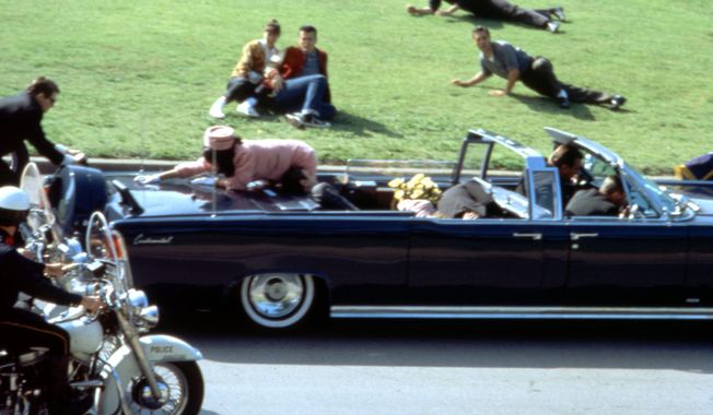 This image provided by Warner Bros. from Oliver Stone&#x27;s 1991 movie &quot;JFK&quot; shows a recreation of the assassination of U.S. President John F. Kennedy in Dallas. &quot;This murder in broad daylight ... Everything changed,&quot; says Stone, the Baby Boomer director who served in Vietnam and made a movie about it before turning his critical lens on the Kennedy assassination. (AP Photo/Warner Bros.)
