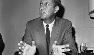 **FILE** Pete Rozelle, commissioner of the National Football League, talks at an informal news conference during a break in Washington on May 18, 1966 session of the league meeting in a Washington hotel. (AP Photo/Bob Schutz)