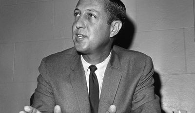 **FILE** Pete Rozelle, commissioner of the National Football League, talks at an informal news conference during a break in Washington on May 18, 1966 session of the league meeting in a Washington hotel. (AP Photo/Bob Schutz)
