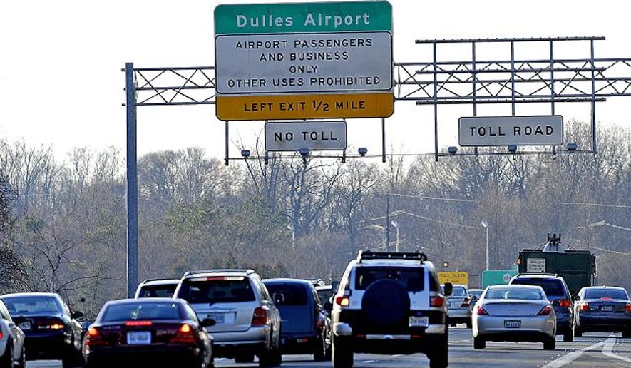 **FILE** The Dulles Toll Road in Northern Virginia (The Washington Times)