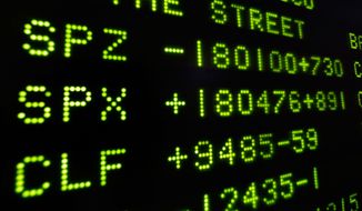 A board at the New York Stock Exchange shows the closing number for the Stand &amp; Poor&#39;s 500 index, center, Friday, Nov. 22, 2013. The S&amp;P rose nine points, or 0.5 percent, to close at 1,804.76. The stock market is on track for a 27 percent gain this year.  (AP Photo/Richard Drew)