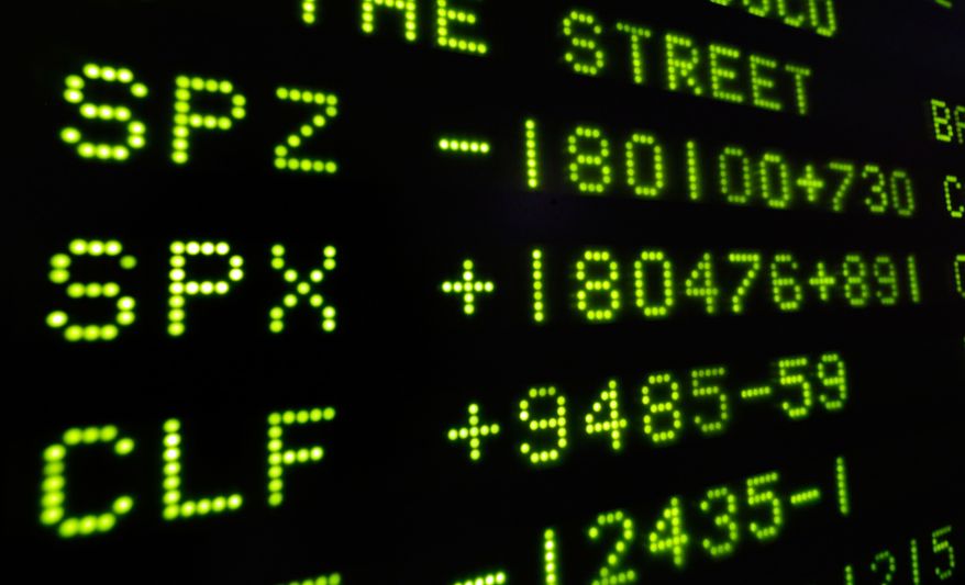 A board at the New York Stock Exchange shows the closing number for the Stand & Poor's 500 index, center, Friday, Nov. 22, 2013. The S&P rose nine points, or 0.5 percent, to close at 1,804.76. The stock market is on track for a 27 percent gain this year. (AP Photo/Richard Drew)