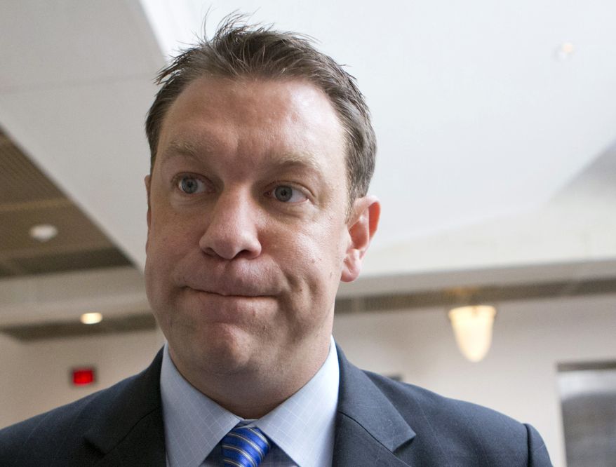 ** FILE ** This Sept. 3, 2013, file photo, shows Rep. Henry "Trey" Radel, R-Fla., on Capitol Hill in Washington. The chairman of the Republican Party of Florida on Monday, Nov. 25, 2013, called for Radel to step down following his recent cocaine conviction. (AP Photo/J. Scott Applewhite, File)