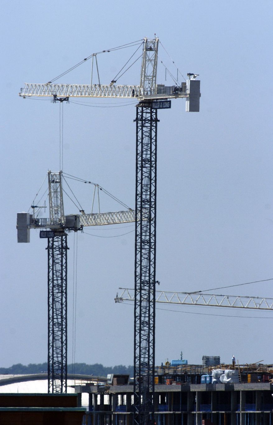 Construction cranes dot the horizon in NW Washington D.C., Tuesday, May 29, 2007. (Allison Shelley / The Washington Times)