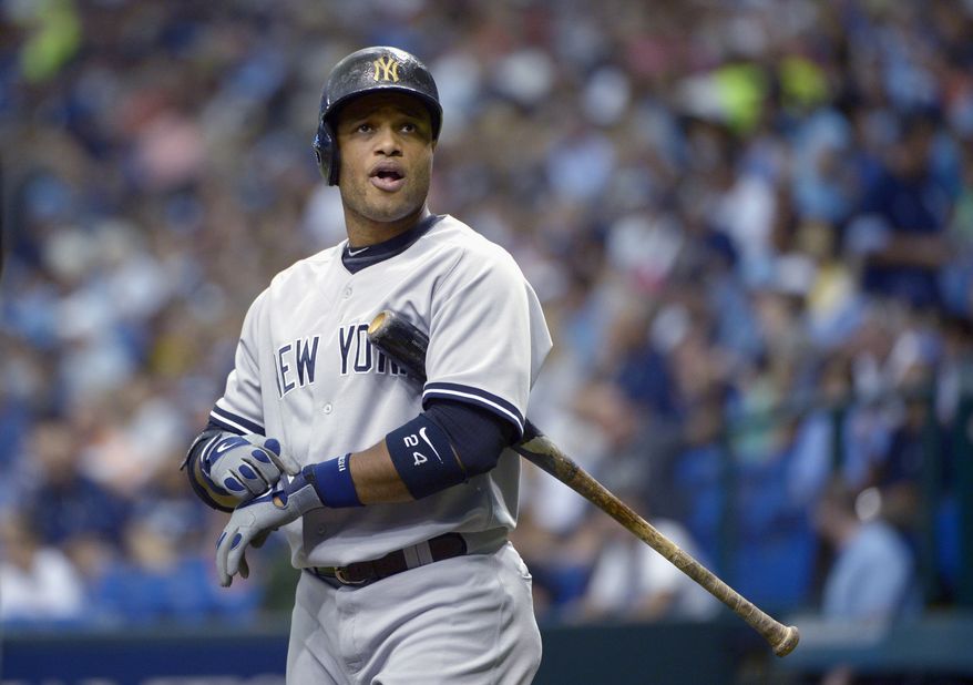 FILE - In this Aug. 25, 2013, file photo, New York Yankees' Robinson Cano looks to the stands while batting during the first inning of a baseball game against the Tampa Bay Rays in St. Petersburg, Fla. Representatives for the free-agent met Tuesday, Nov. 26, 2013, with the Yankees, and the gap between the sides remains wide, according to a person familiar with the negotiations. The person spoke to The Associated Press on condition of anonymity because no statements were authorized. The person adds the sides may meet again Wednesday. (AP Photo/Phelan M. Ebenhack, File)