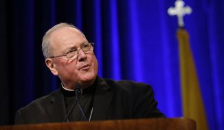 ** FILE ** This Nov. 11, 2013, photo shows Cardinal Timothy Dolan, of New York, president of the United States Conference of Catholic Bishops, delivering remarks at the conference&#39;s annual fall meeting in Baltimore. (AP Photo/Patrick Semansky, File)