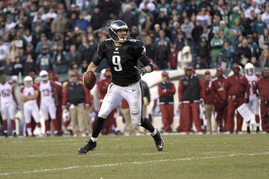 Philadelphia Eagles' Nick Foles in action during the second half of an NFL football game against the Arizona Cardinals, Sunday, Dec. 1, 2013, in Philadelphia. Philadelphia won 24-21. (AP Photo/Michael Perez)