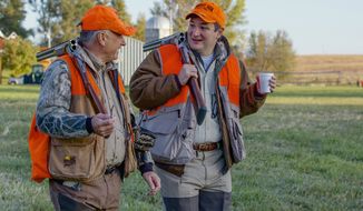 GUNNING FOR A RUN: Rep. Steve King of Iowa takes Sen. Ted Cruz of Texas (right), a prospective Republican presidential candidate, on a pheasant hunt in Mr. King&#39;s home state, which will decide early winners and losers. (Associated Press photographs)