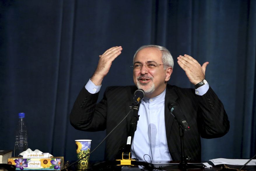 Iran's foreign minister Mohammad Javad Zarif, delivers an address to students at the University of Tehran in Tehran, Iran, Tuesday, Dec. 3, 2013. Iran's foreign minister is saying Israeli Prime Minister Benjamin Netanyahu has become desperate after last month Iran agreed to cap its nuclear program in return to easing sanctions by the West. (AP Photo/Ebrahim Noroozi)