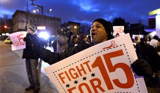 ** FILE ** Demonstrators rally for better wages outside a McDonald&#39;s restaurant in Chicago, Thursday, Dec. 5, 2013. Demonstrations planned in 100 cities are part of push by labor unions, worker advocacy groups and Democrats to raise the federal minimum wage of $7.25. (AP Photo/Paul Beaty)