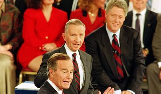 Democratic presidential candidate Bill Clinton, top, and Independent candidate Ross Perot, center, react to Republican candidate President George Bush, foreground, during the second presidential debate at the University of Richmond, Va., Oct. 15, 1992.  (AP Photo/Steve Helber) **FILE**