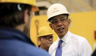 ** FILE ** President Obama tours ArcelorMittal, a steel mill in Cleveland, Nov. 14, 2013. (AP Photo/Pablo Martinez Monsivais)