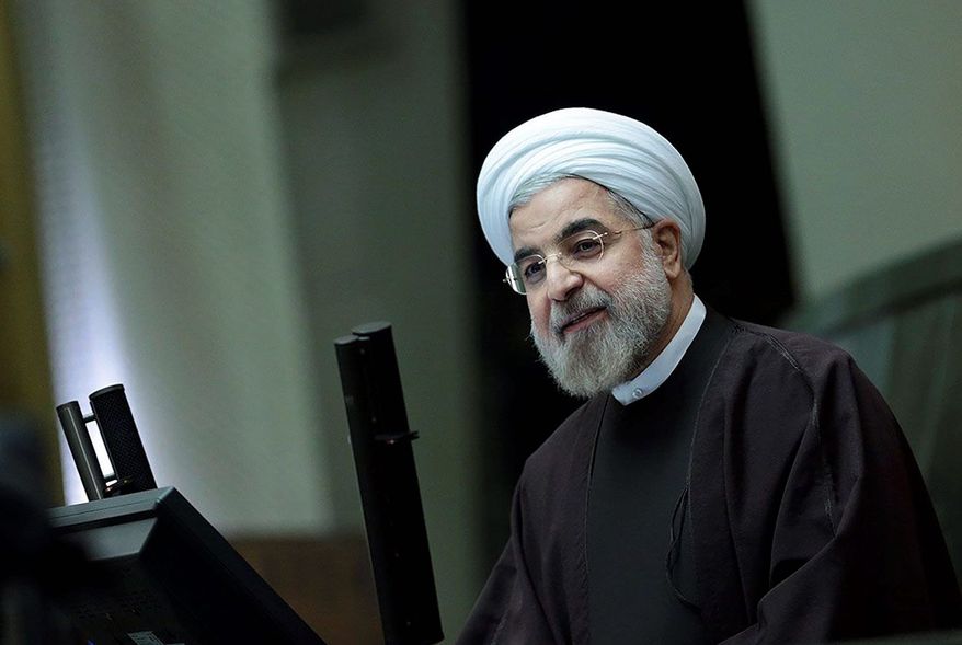 Iranian President Hassan Rouhani says Sunday that the nuclear deal with world powers already has boosted the country's economy. "They're ready to buy; they have the money now," said E.J. Miller, founder of the Iran America Chamber of Commerce. (Office of the president of Iran via Associated Press)