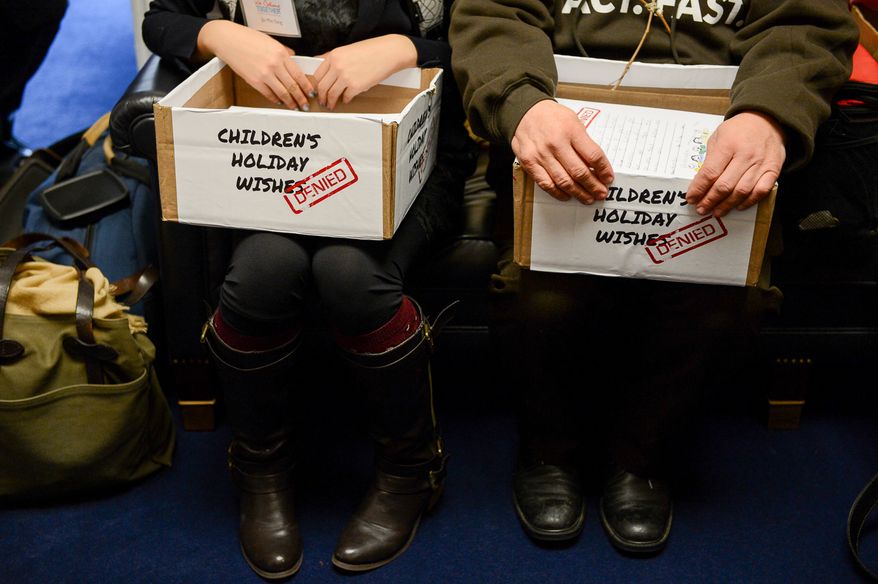 Thousands of holiday letters from children delivered to congressmen to pass immigration reform during a demonstration organized by members of We Belong Together, a group for "common sense immigration reform" on Capitol Hill, Washington, D.C., Monday, December 9, 2013. (Andrew Harnik/The Washington Times)