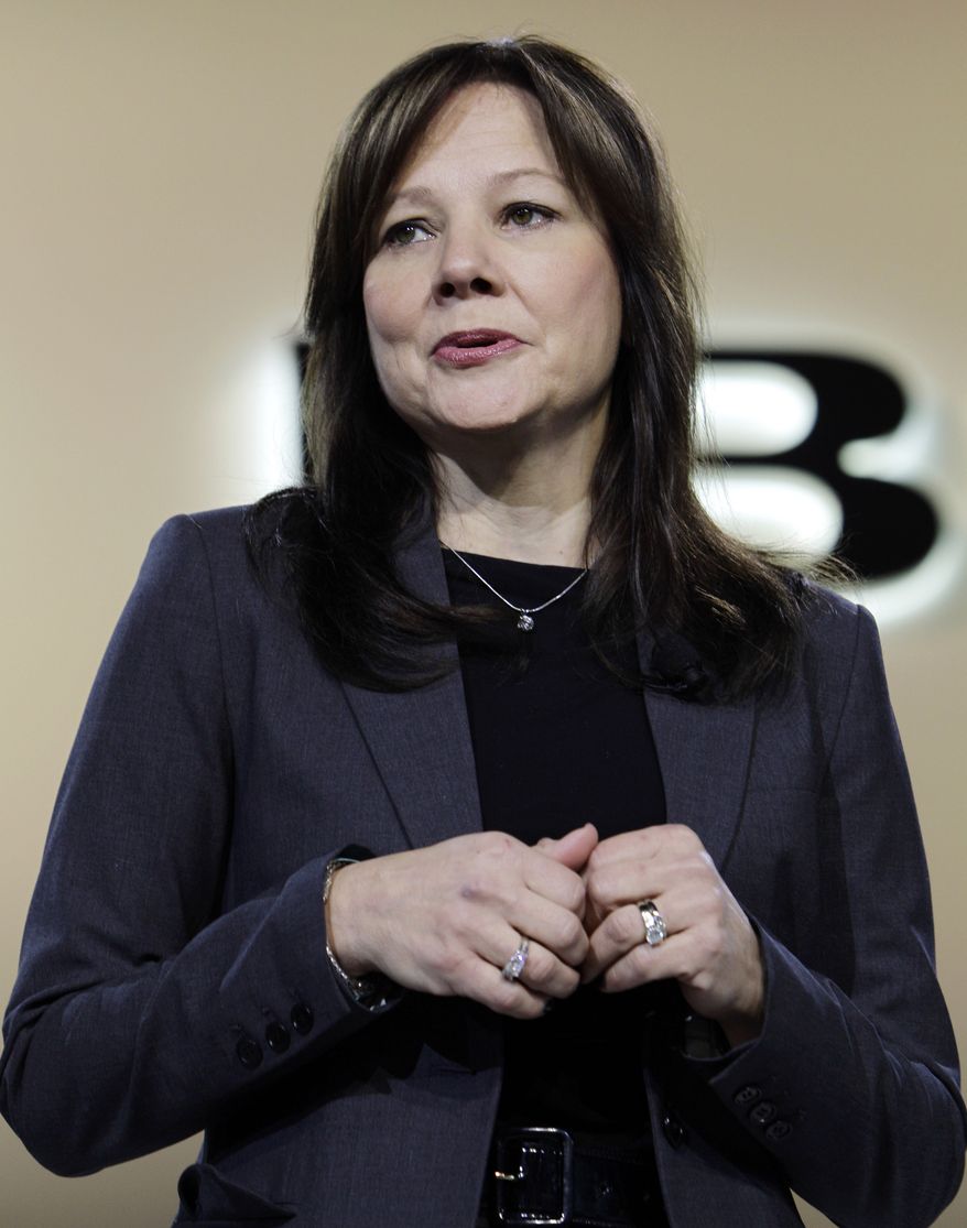** FILE ** Mary Barra, senior vice president for global product development at General Motors, speaks at the debut of the 2013 Buick Encore at the North American International Auto Show in Detroit on Jan. 10, 2012. (AP Photo/Paul Sancya)