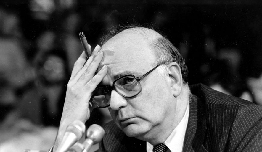 In this March 18, 1980, file photo, Federal Reserve Board Chairman Paul Volcker listens to a question as he appears before the Senate Banking Committee in Washington, D.C. The Federal Reserve and the Federal Deposit Insurance Corp. each unanimously voted to adopt the so-called Volcker Rule, taking a major step toward preventing extreme risk-taking on Wall Street that helped trigger the 2008 financial crisis. The rule which states that U.S. banks will be barred in most cases from trading for their own profit under a federal rule is named after Paul Volcker, a former Fed chairman who was an adviser to President Barack Obama during the financial crisis. (AP Photo/Chick Harrity, File)