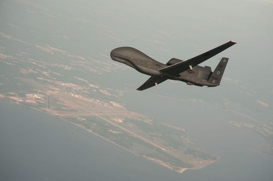 An RQ-4 Global Hawk unmanned aerial vehicle conducts tests over the Naval Air Station in Patuxent River, Md. (NORTHROP GRUMMAN VIA ASSOCIATED PRESS)