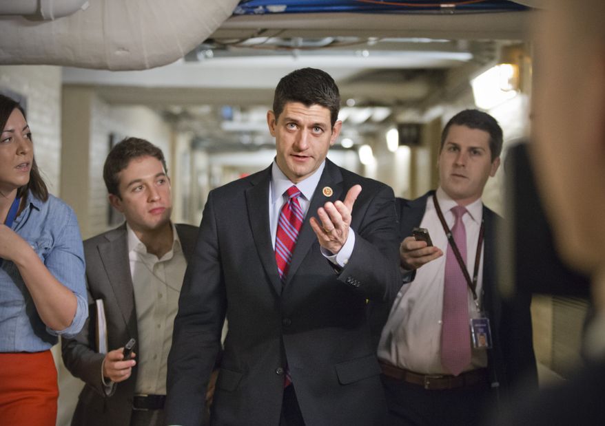 Walking through a basement corridor on Capitol Hill in Washington, Wednesday, Dec. 11, 2013, House Budget Committee Chairman Rep. Paul Ryan, R-Wis., is pursued by reporters on the morning after a budget deal was worked out between Ryan and Senate Budget Committee Chair Sen. Patty Murray, D-Wash. After Ryan presented his plan to the House Republican Conference this morning, Speaker of the House John Boehner, R-Ohio, and GOP leaders signaled support for the deal, which was one of a few key measures left on Congress' to-do list near the end of a bruising year that has produced a partial government shutdown, a flirtation with a first-ever federal default and gridlock on President Obama's agenda. (AP Photo/J. Scott Applewhite)